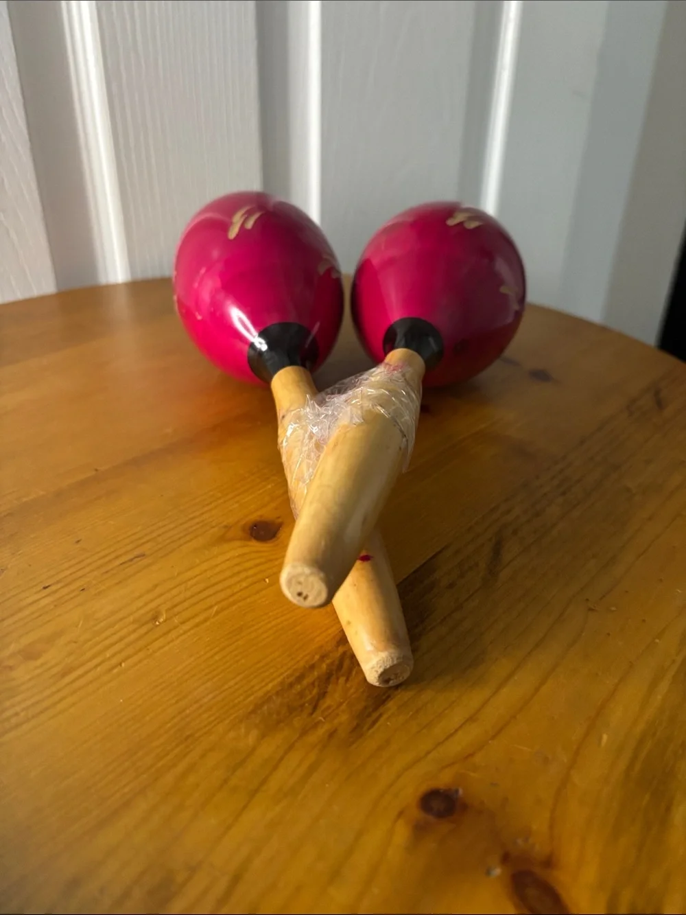 Pair of Magenta Wooden Maracas with Gold Accents